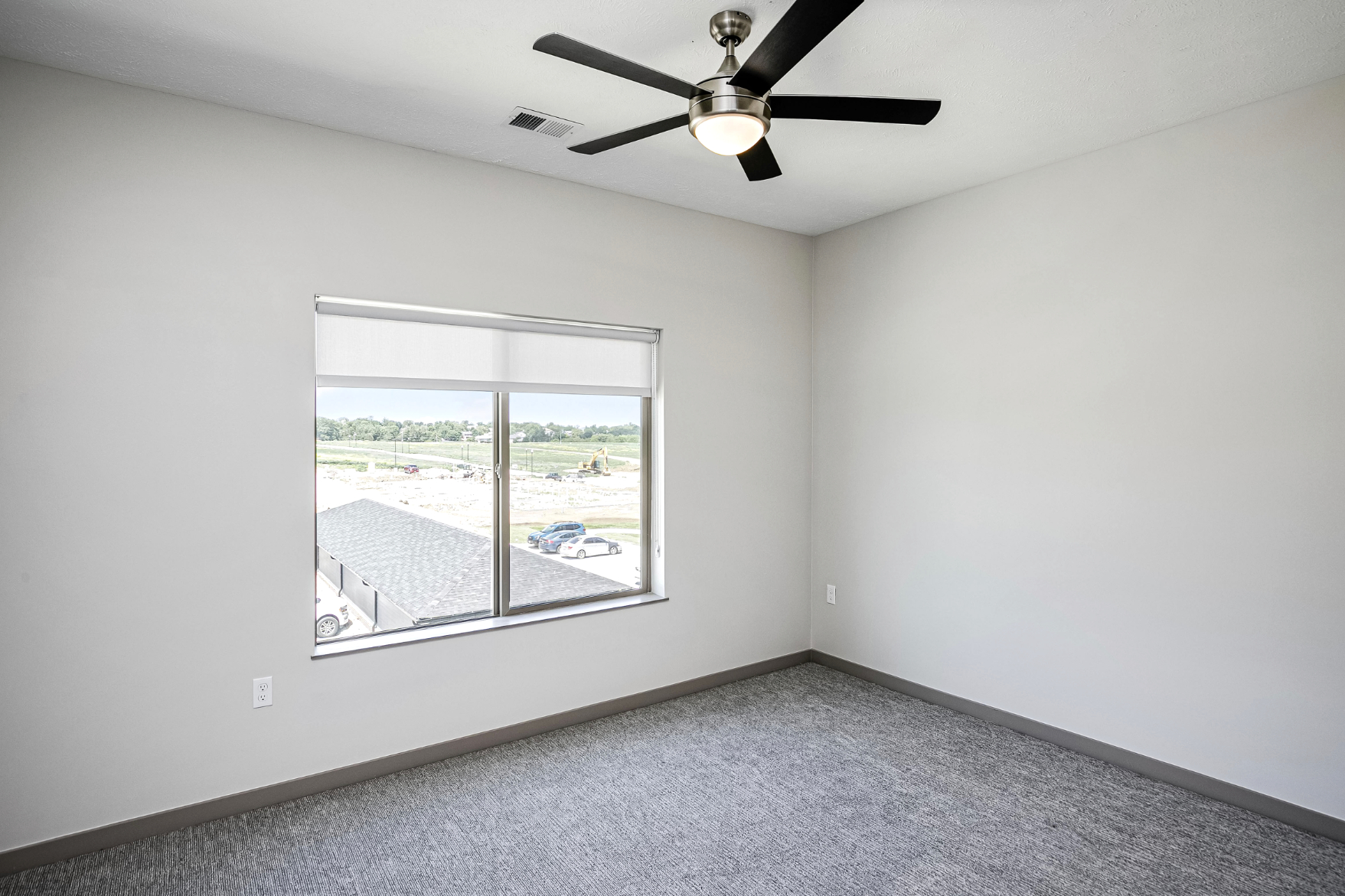 Unfurnished bedroom with window