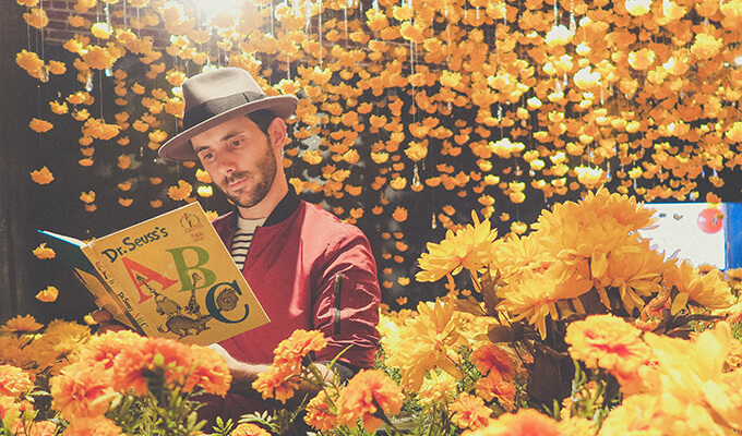 creativity blossoming man reading and flowers