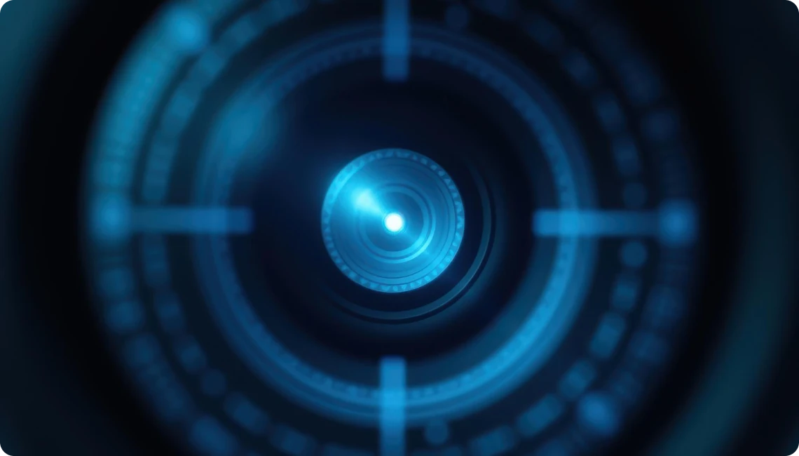 Blue circular digital interface with concentric rings and glowing center resembling a futuristic scanner or HUD.