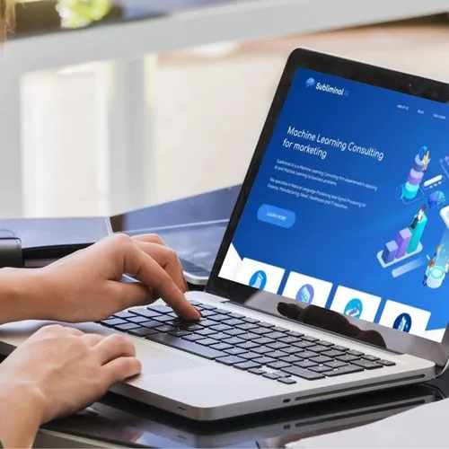 A laptop showing landing page showcasing AI-driven solutions for employee training and engagement through innovative technologies.