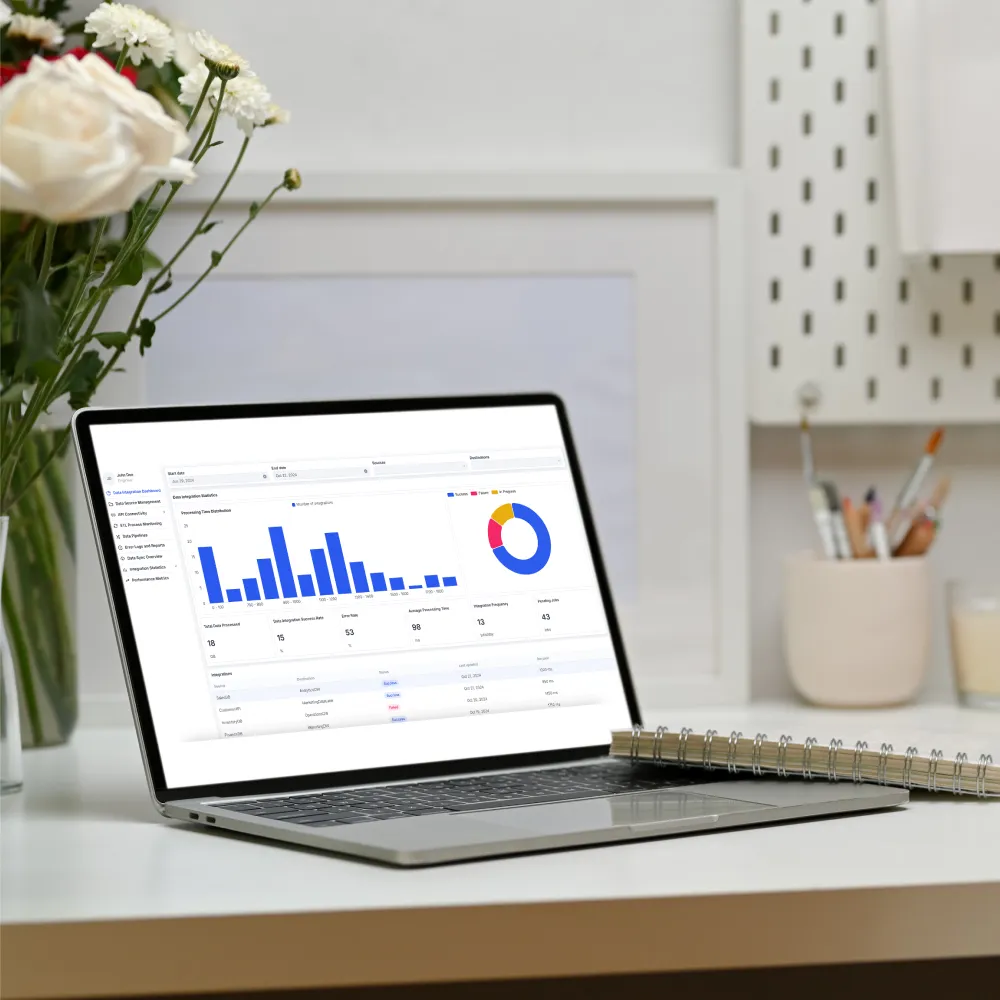 A laptop displaying a graph, symbolizing optimized database performance and user-friendly interface for data management.