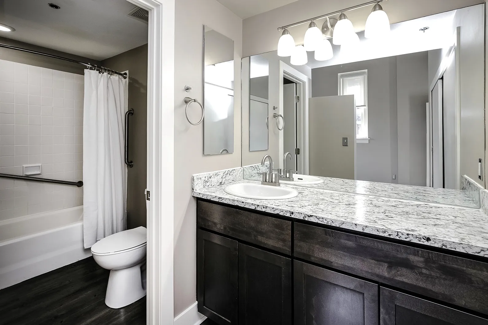 Empty bathroom with shower and toilet