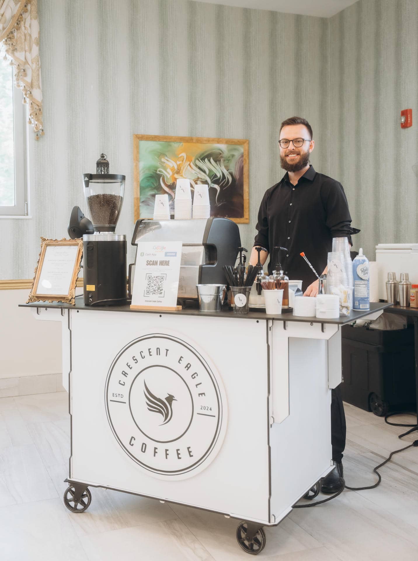 Mon Hadzovic serving specialty coffee with his business, Crescent Eeagle Coffee.