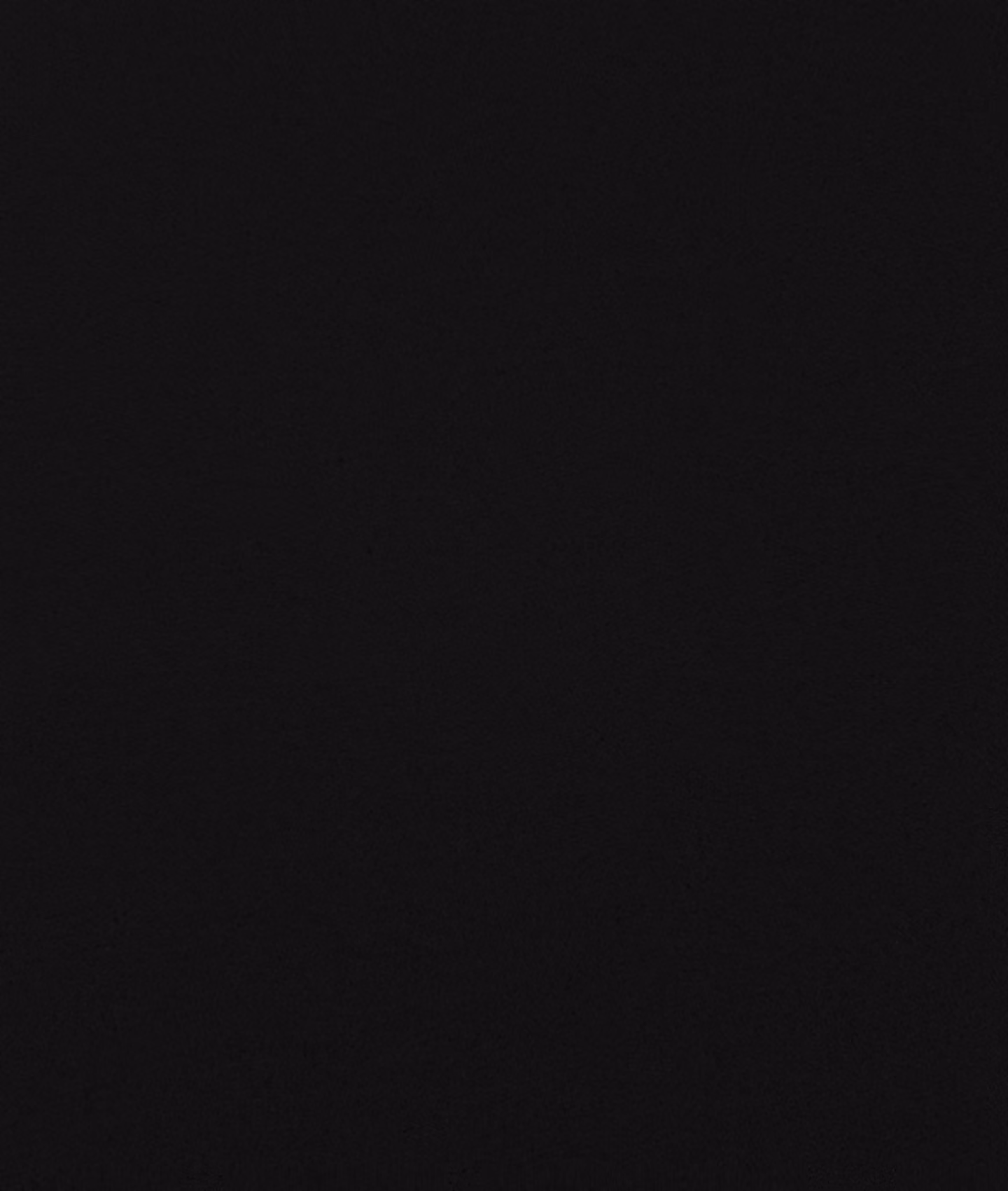 Solid black textured background.