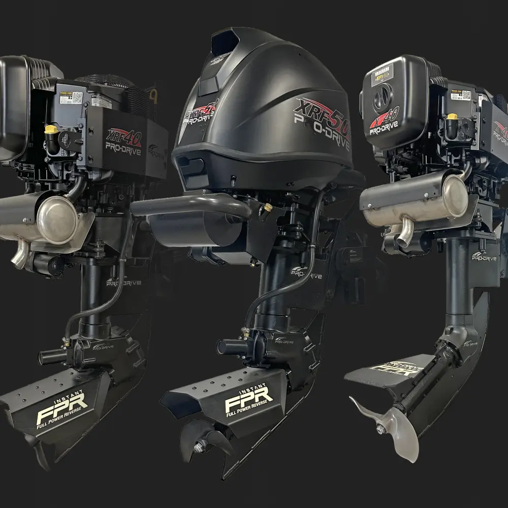 Three black Pro-Drive marine outboard motors labeled XRF 4.0 and XRF 5.0 with full power reverse props.