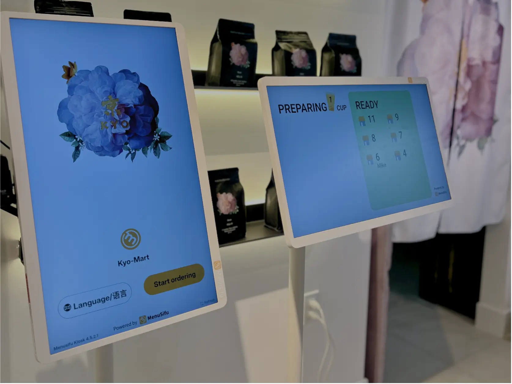 MenuSifu self-ordering kiosk and digital waitlist screen at KYO, showing real-time order preparation and pickup status.