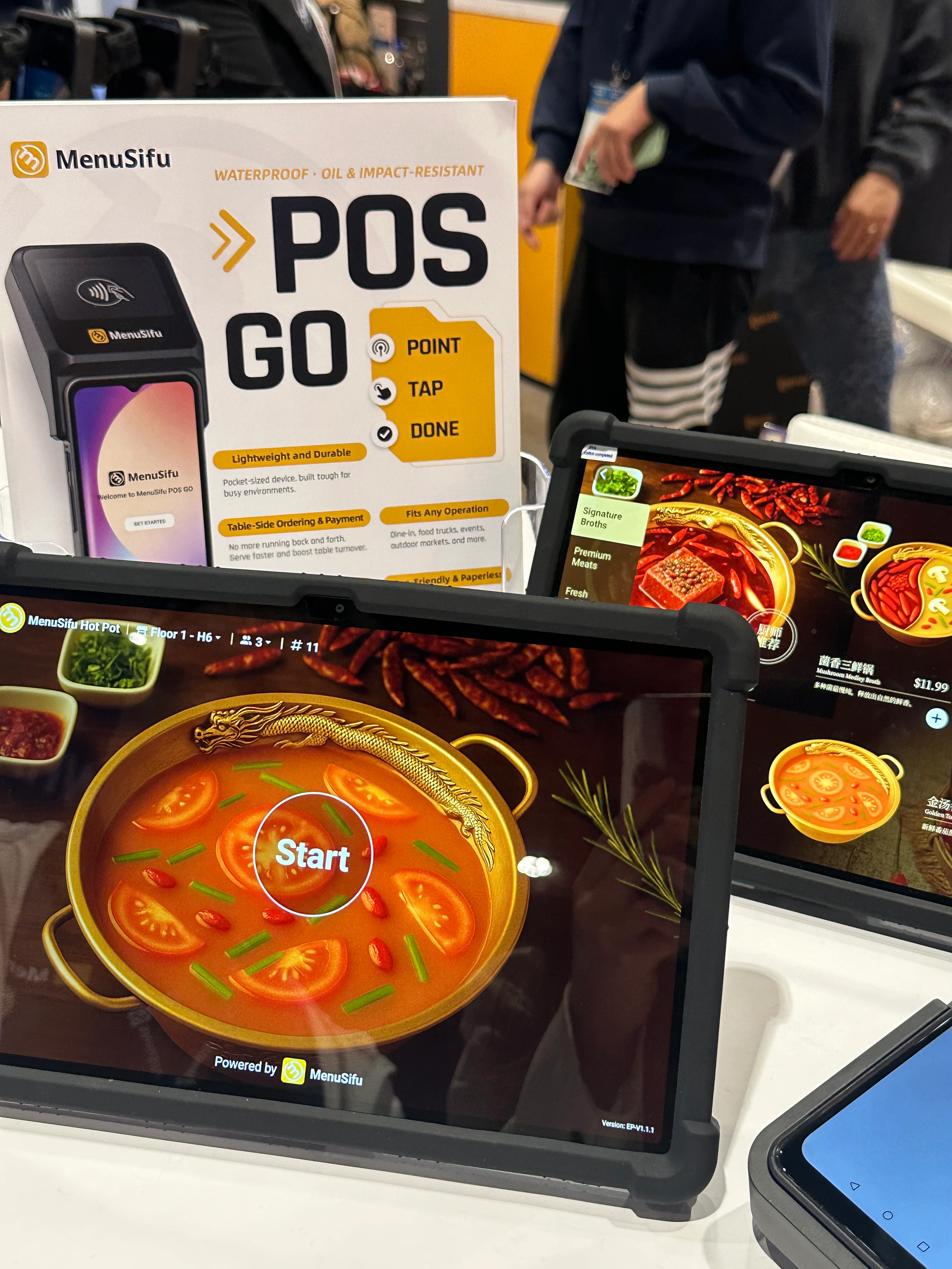 MenuSifu’s E-Menu Pro used in a stylish cafe setting for order and promotions