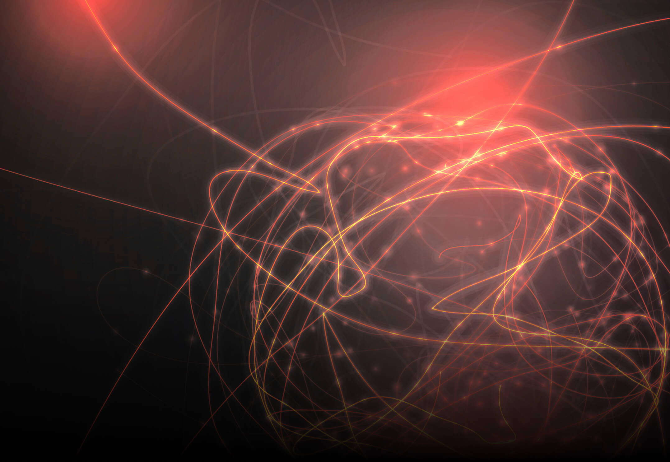 Abstract glowing red and orange light trails swirling against a dark background.