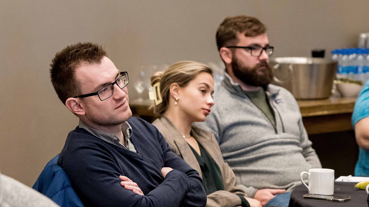 Sean O'Farrell in a meeting with coworkers