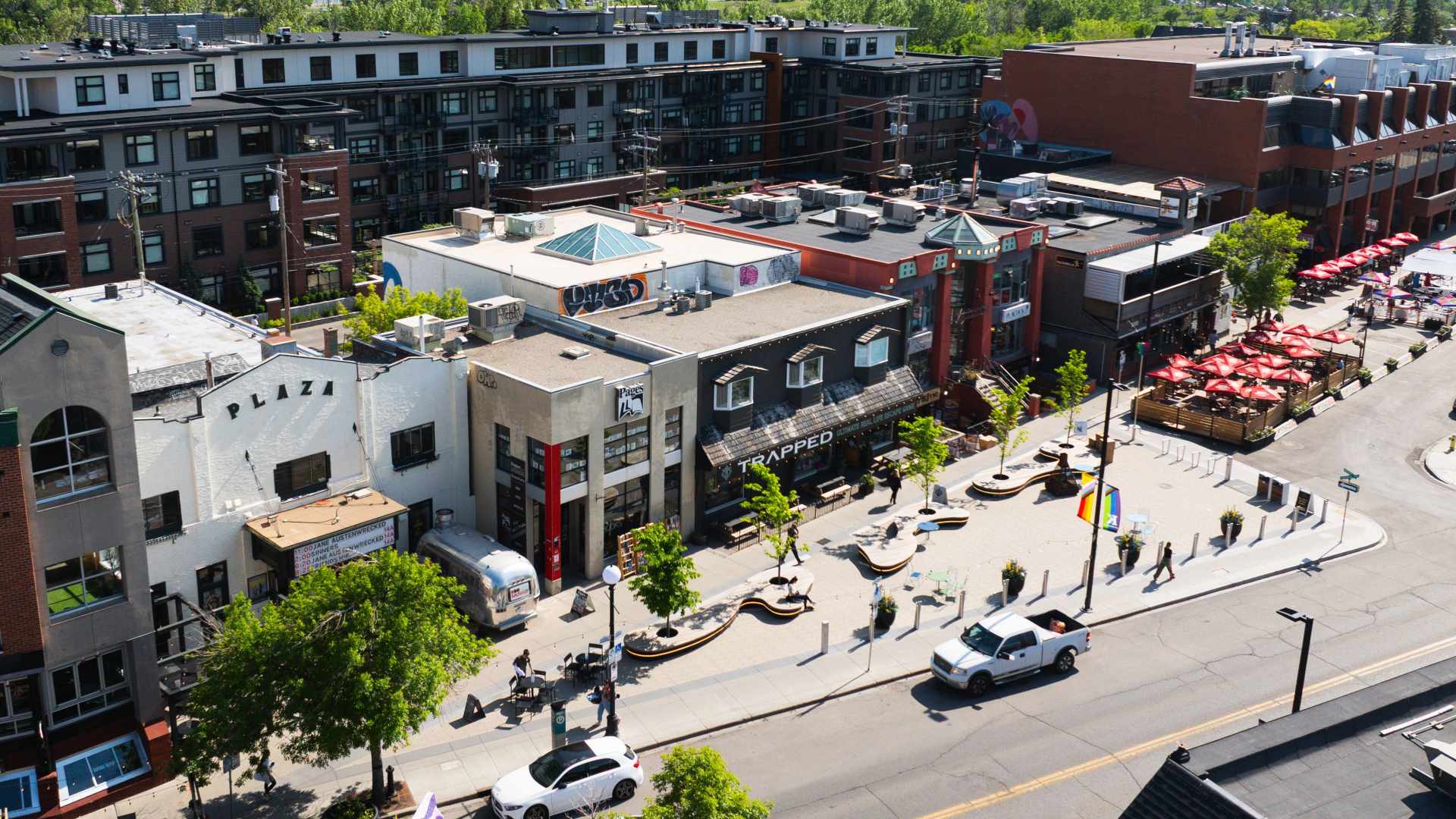 Kensington Crescent with local shops and businesses along the street in Calgary