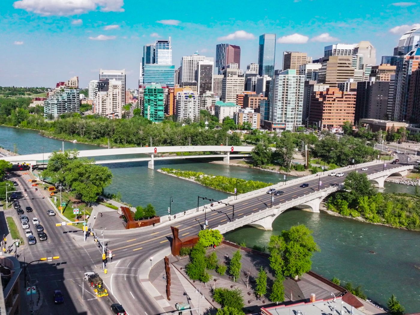 Bow River Pathway looking toward downtown Calgary from Kensington, with Poppy Plaza in view