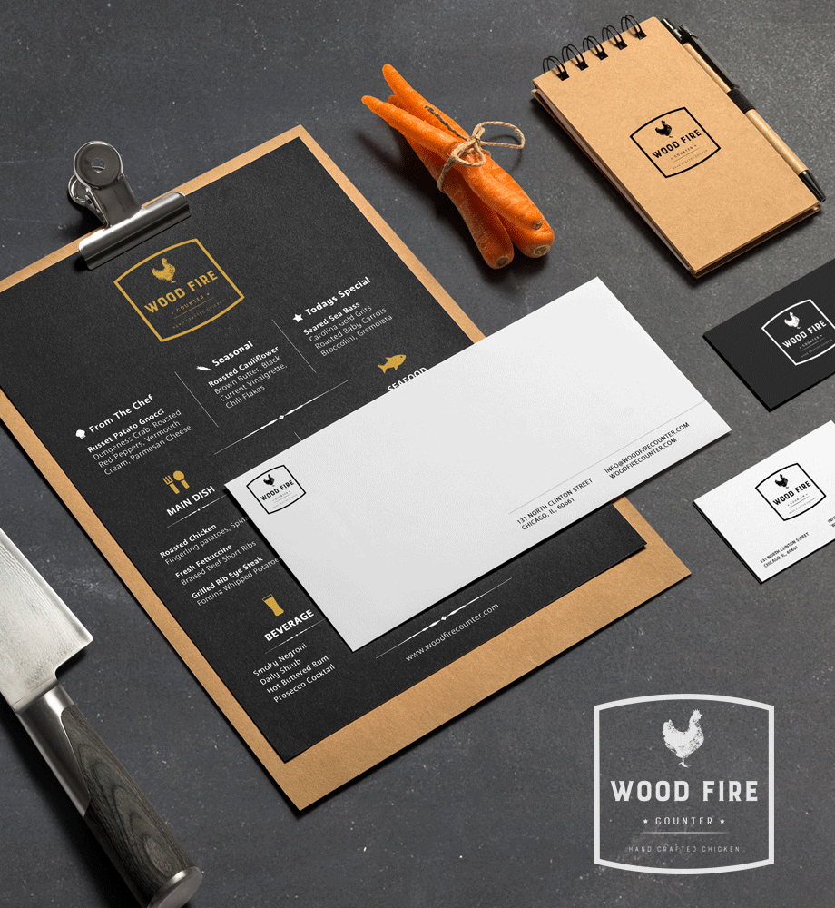 Woodfire Counter stationery and menu mockup — clipboard menu, envelope, business cards, and branded notepad with visual identity system by Kalibr Studio