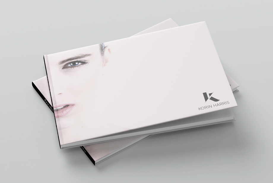 Korin Harris Photography brand book — hardcover lookbook with minimal white cover and K monogram
