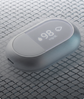 Close-up of a modern glucose monitor displaying a blood sugar level of 98 mg/dL.