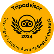 Tripadvisor 2024 Travelers' Choice Awards Best of the Best gold badge with owl logo and laurel wreath.