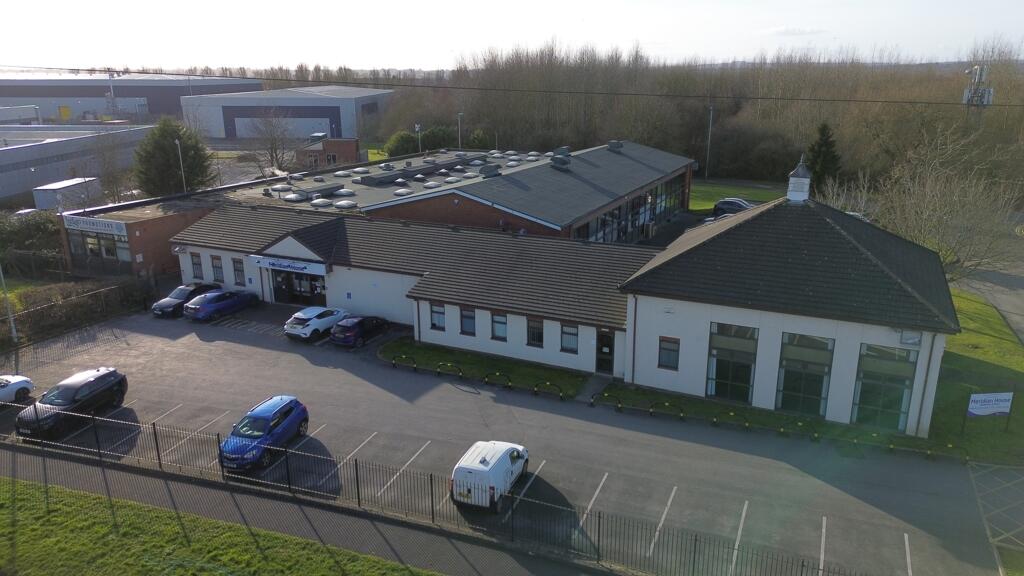 Aerial drone view of Meridian House Winsford — OneTek founding office