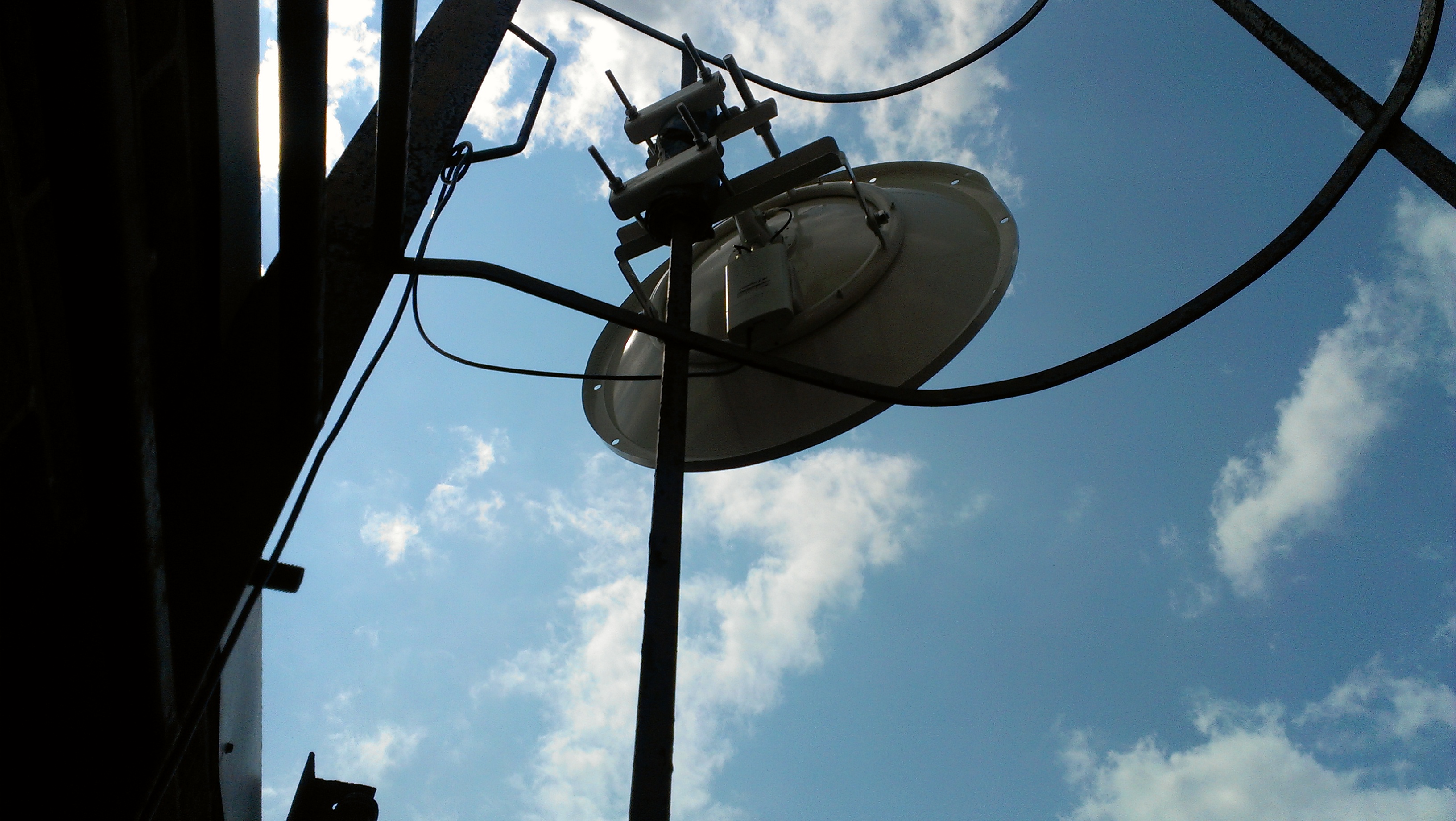 WiFi dish installation on commercial building rooftop