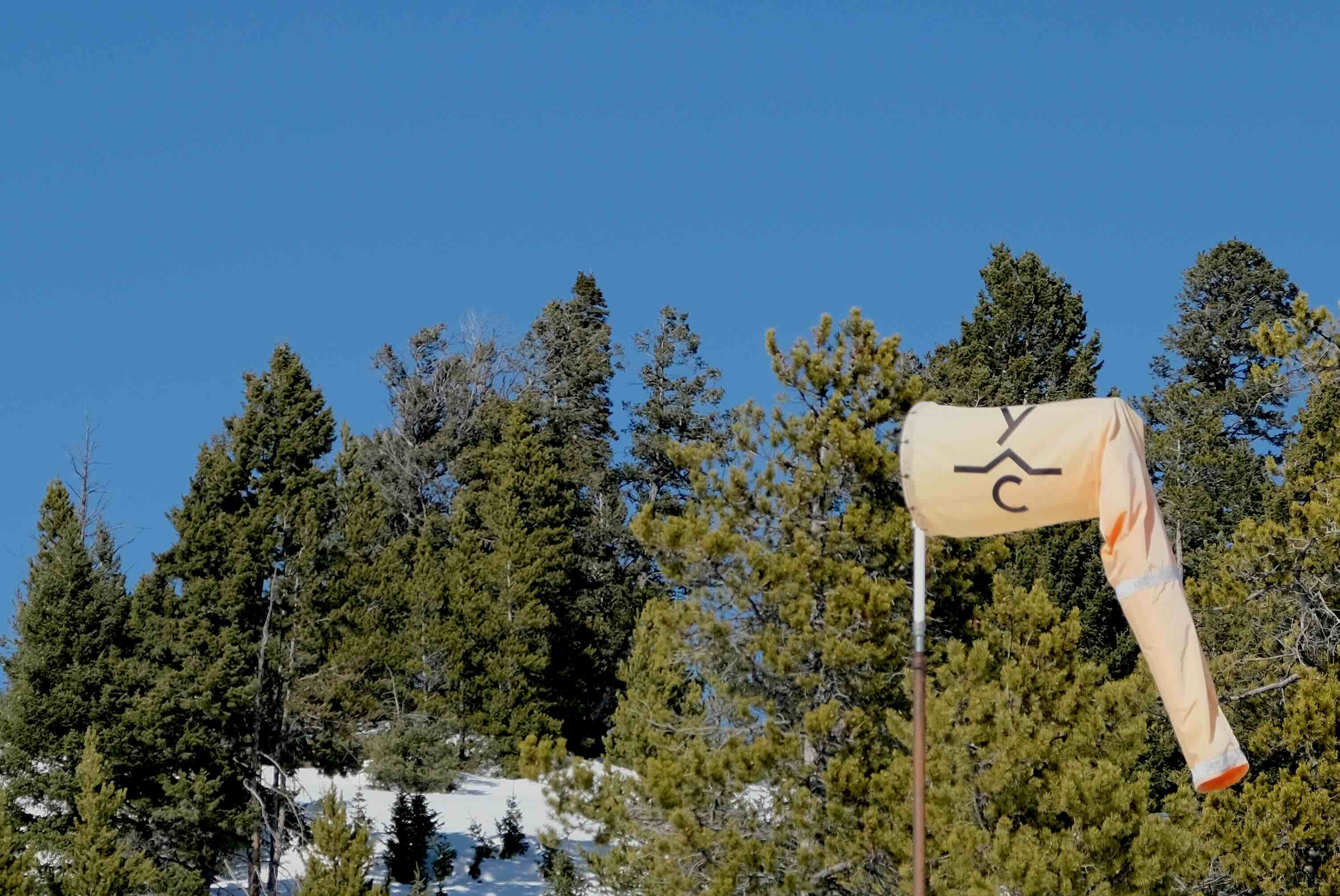 An RV in front of mountains