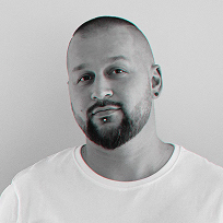 A man lean on the wall in black and white