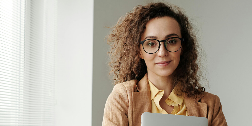 woman-holding-a-laptop