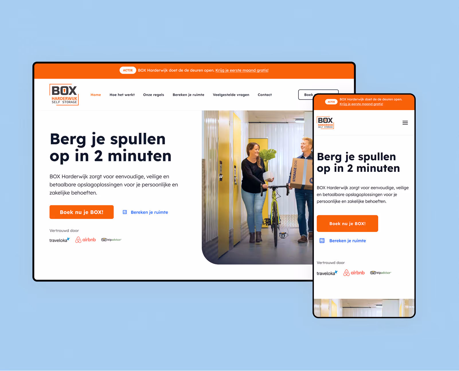 BOX Harderwijk self storage website homepage showing a man and woman with a bicycle in a storage unit hallway and Dutch text about easy, safe, and affordable storage solutions.