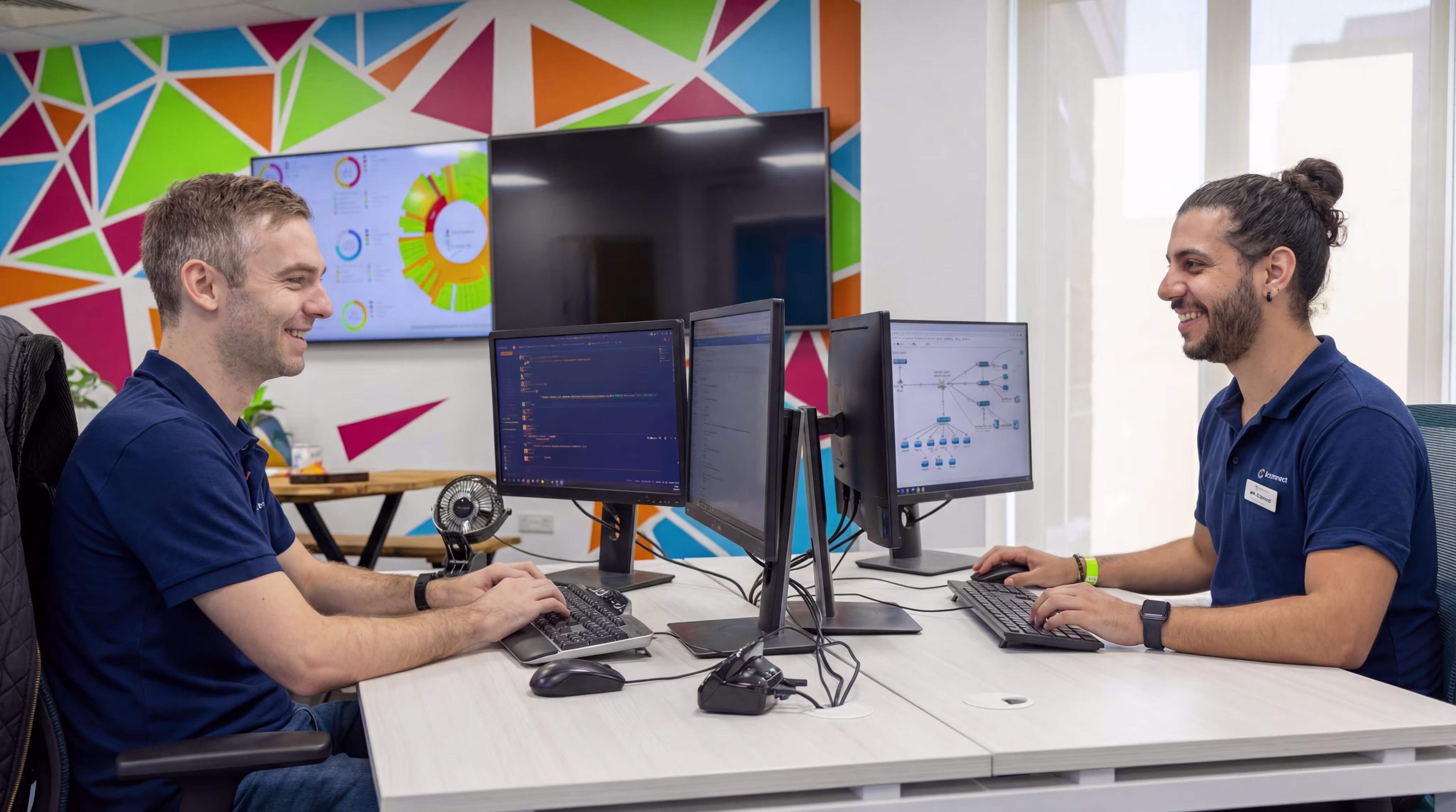 2 women smiling in office