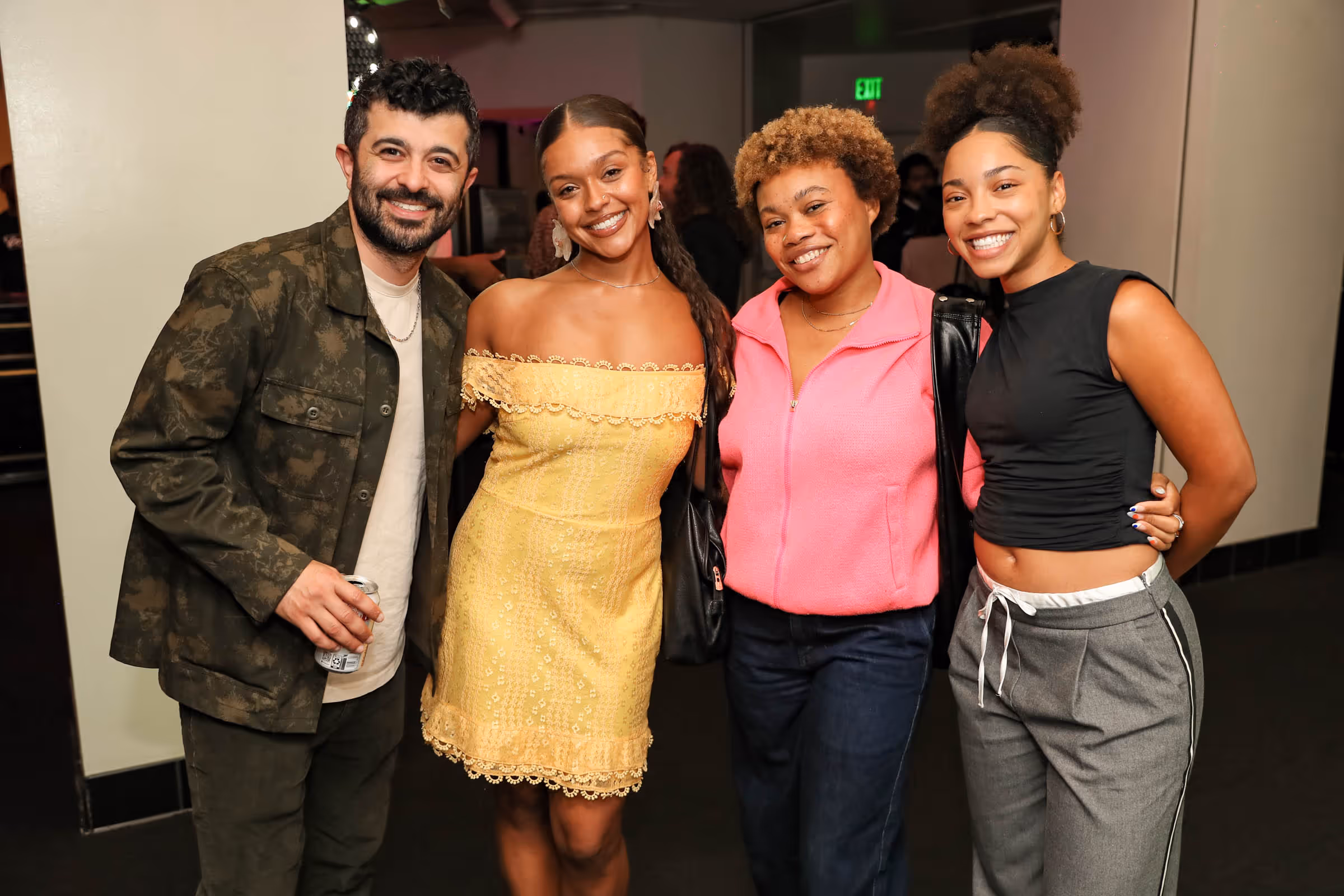 a group of people posing for a photo