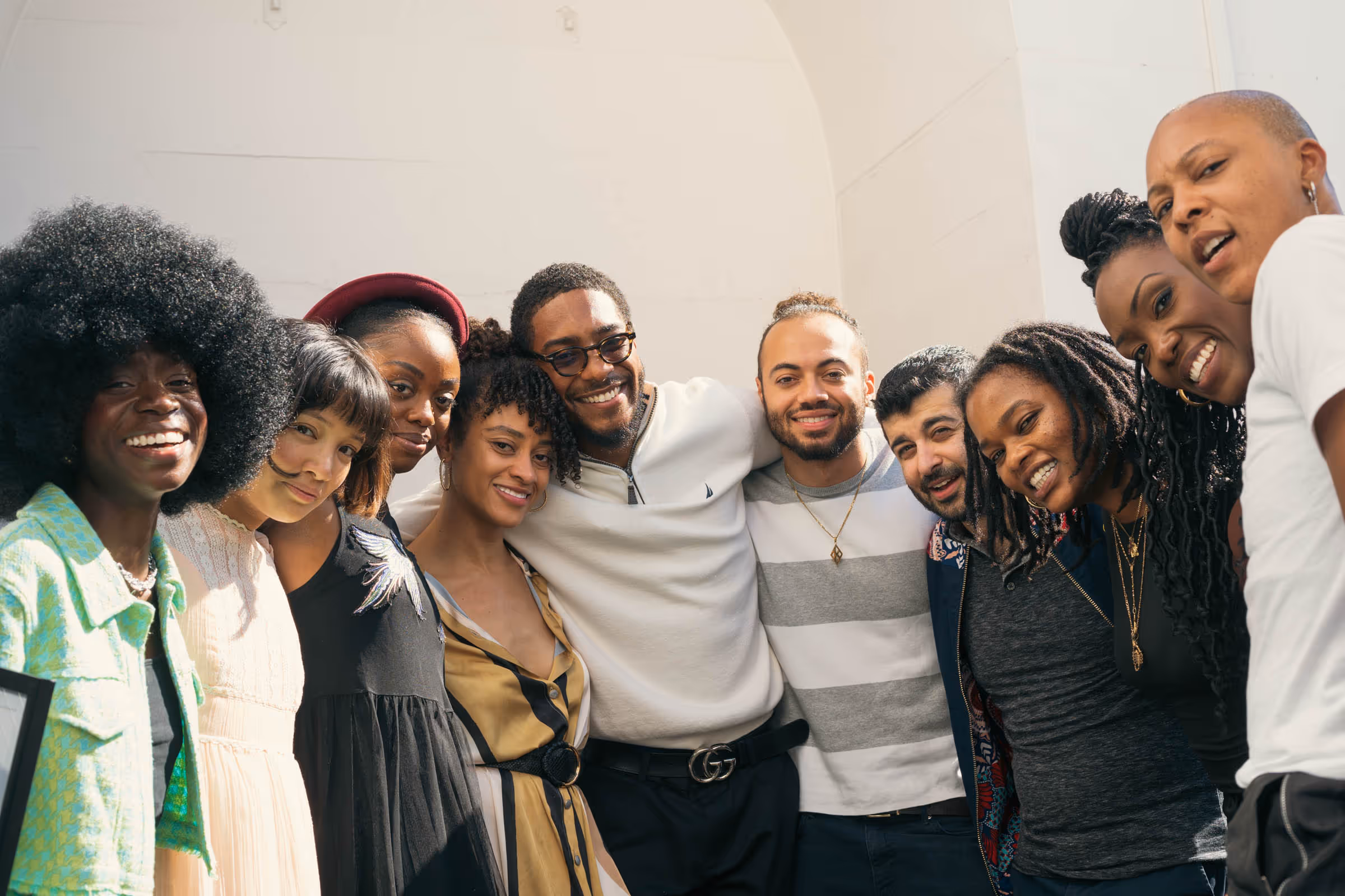 a group of people posing for a photo