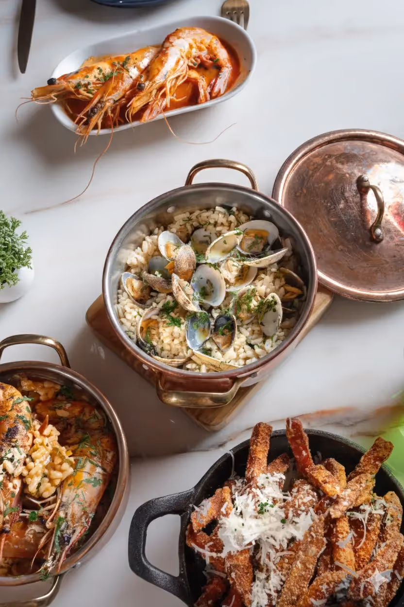 Bartender crafting cocktails at the Hotel Experimental Infante Sagres bar in Porto.