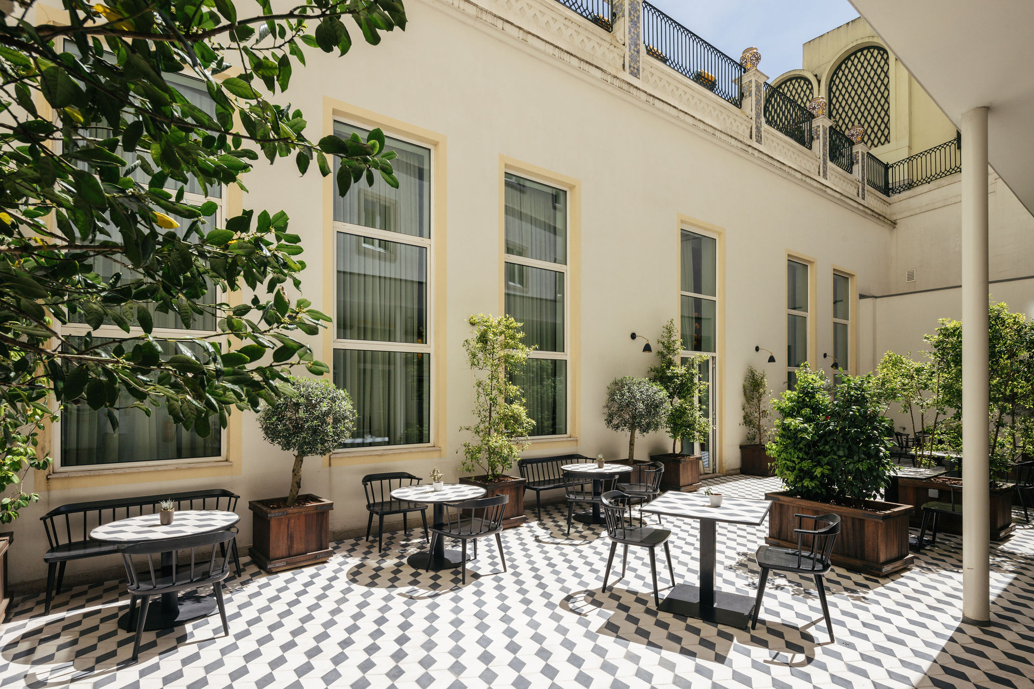 Outdoor terrace of Scarlett restaurant at Hotel Experimental Infante Sagres in Porto.