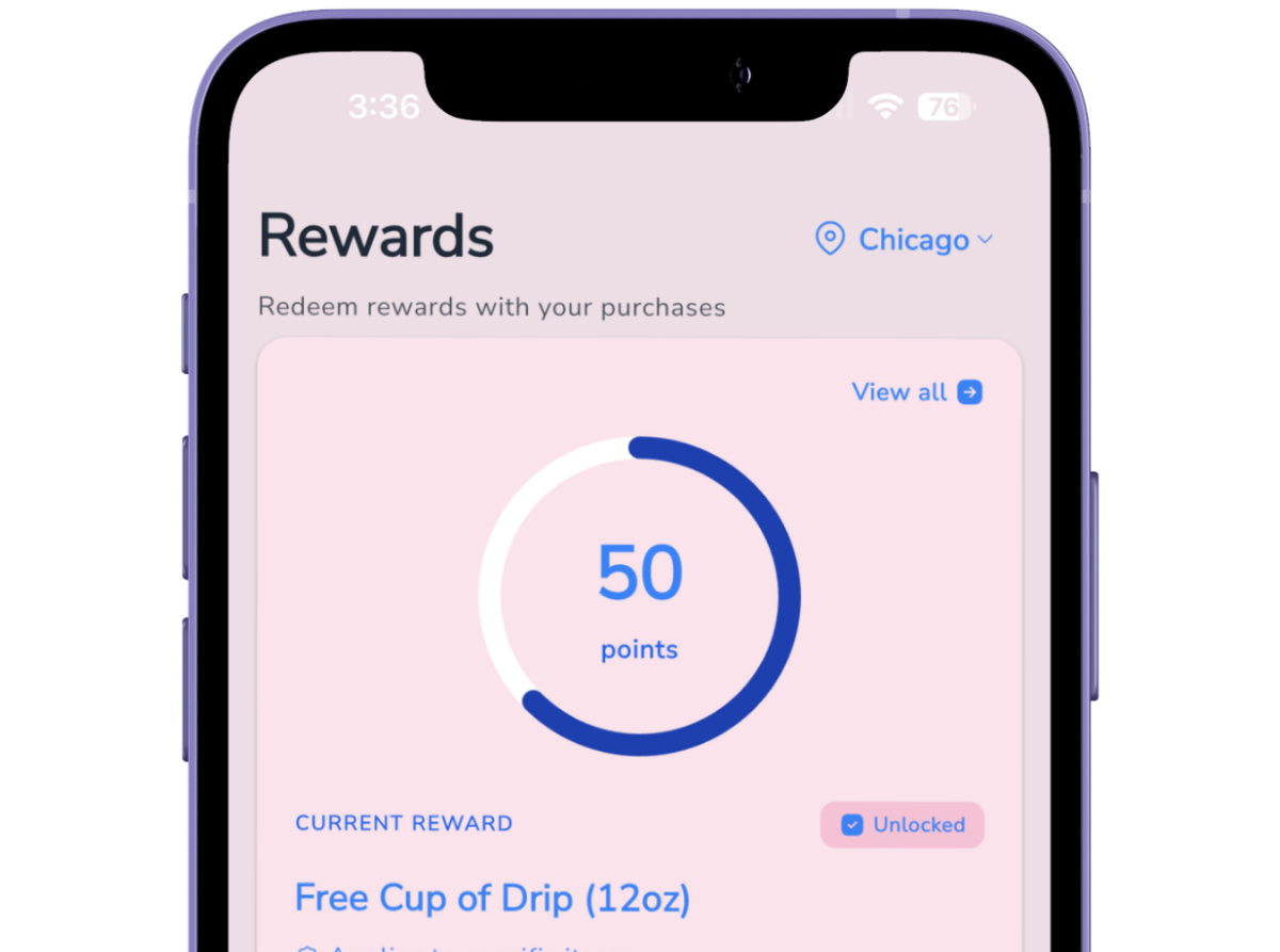 Mobile app screen showing 50 reward points and a current reward unlocked for a free 12oz drip coffee in Chicago.
