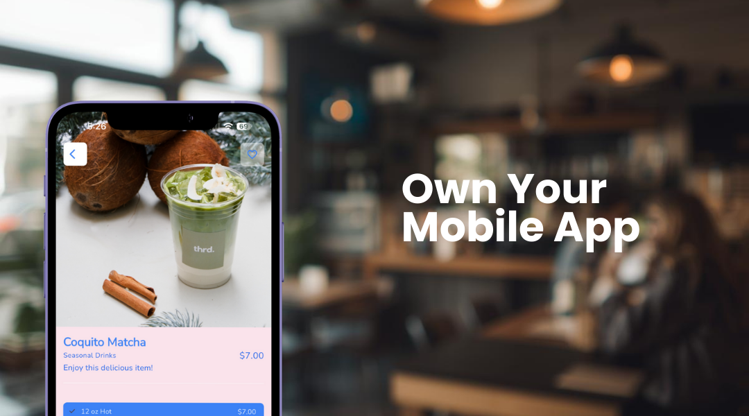 Smartphone displaying a matcha drink menu item priced at $7.00 with text 'Own Your Mobile App' on the right against a blurred cafe background.