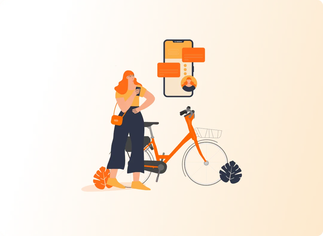 A woman is standing next to a bicycle.