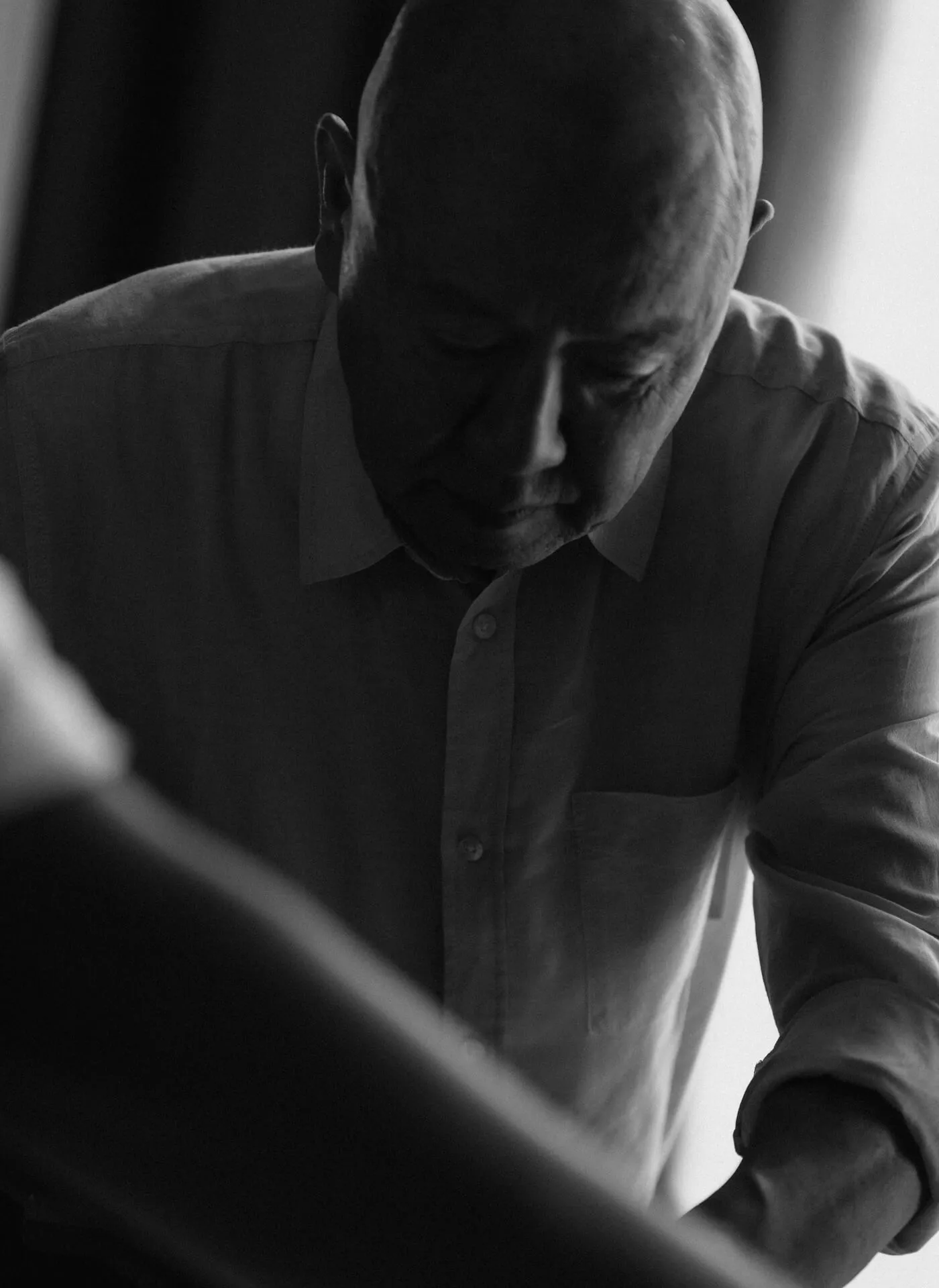 Monotone image of Chef Masa working