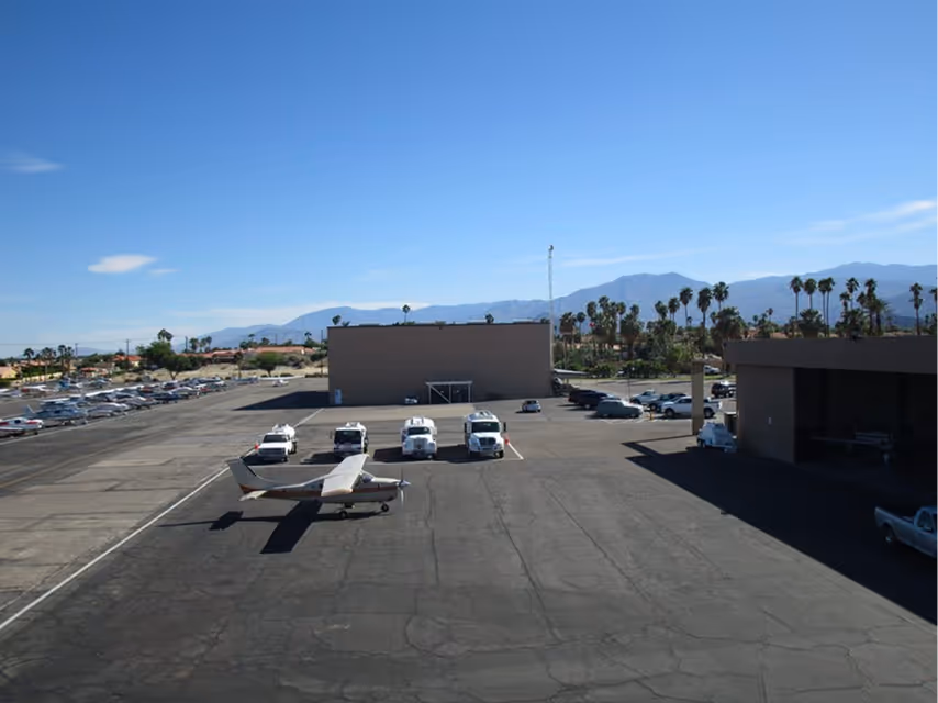 Dunes Air Maintenance Hangar/Terminal Building (West side) to the right, Community Hangar in the center, and our Tie Downs (East side) to the left