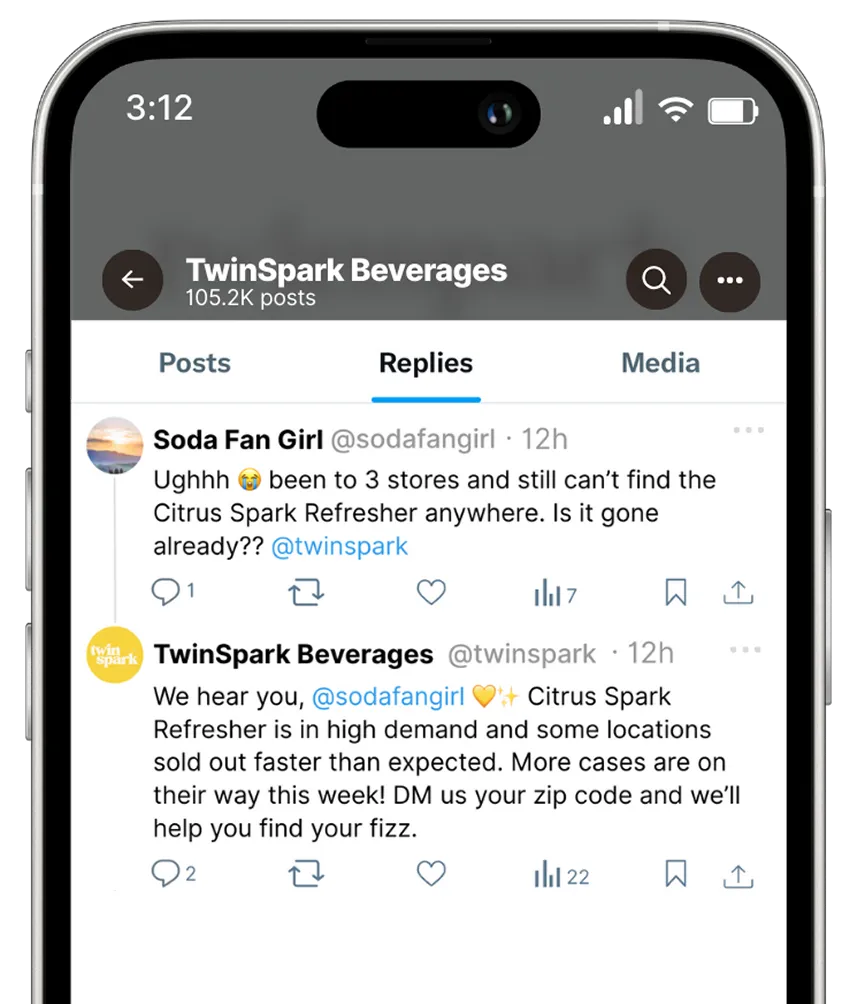 Smartphone screen showing a brand replying to a customer tweet