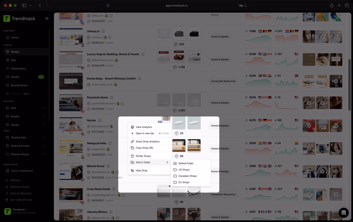 Screenshot of Trendtrack web app showing a menu overlay with options to view analytics, share shop analytics, copy URL, find similar shops, add to folder, and hide shop over a list of shops in different categories.