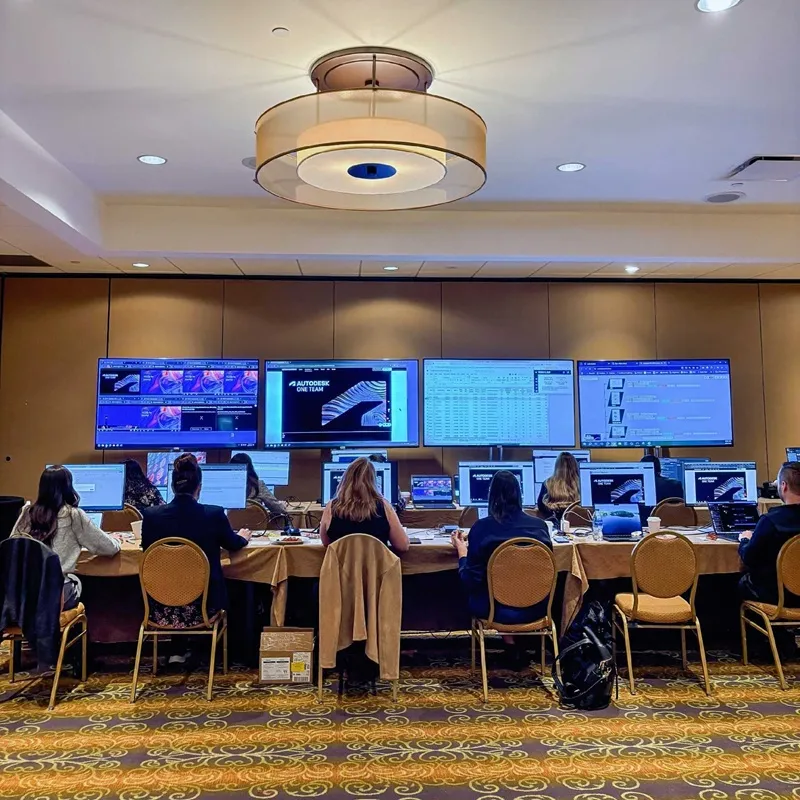 Event operations team managing an Autodesk conference from backstage