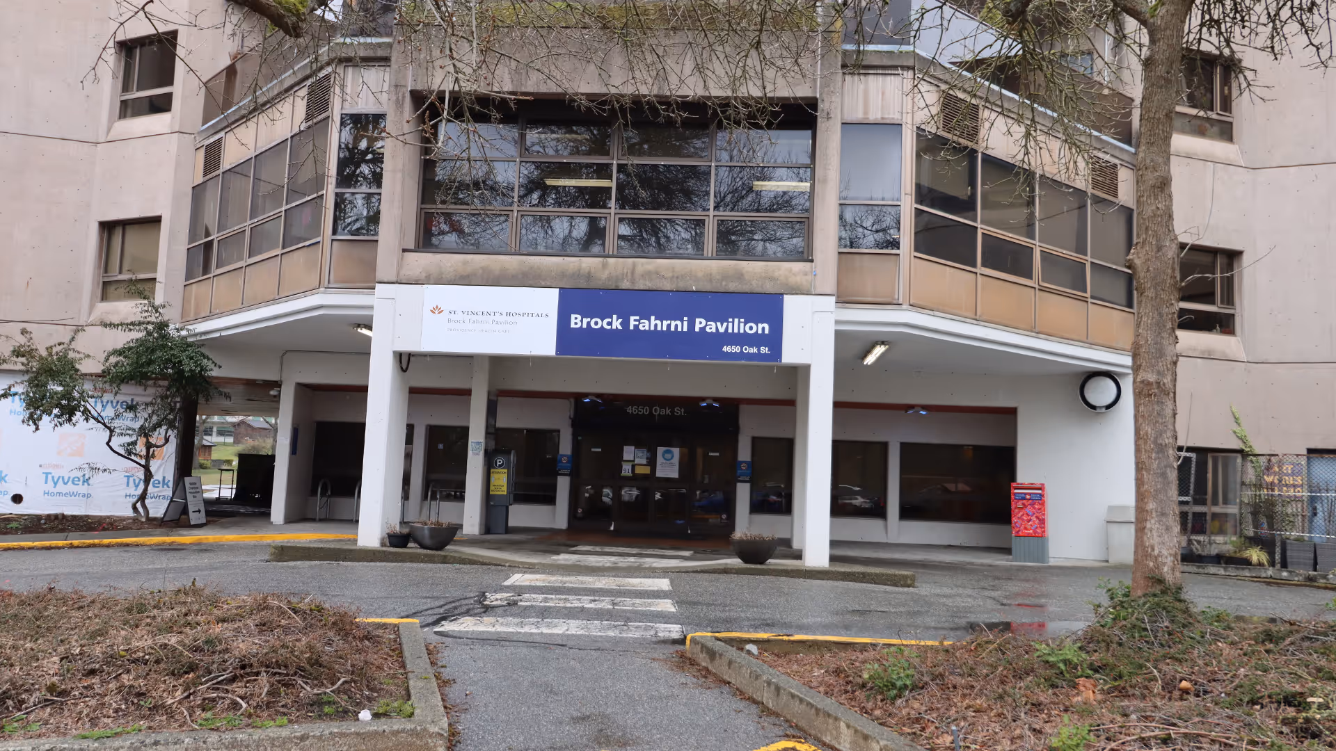 Entrance to Brock Fahrni Pavilion with a sign for St. Vincent’s Hospitals at 4650 Oak St.
