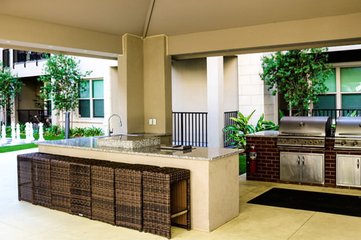 Pool cabana with kitchen and grills