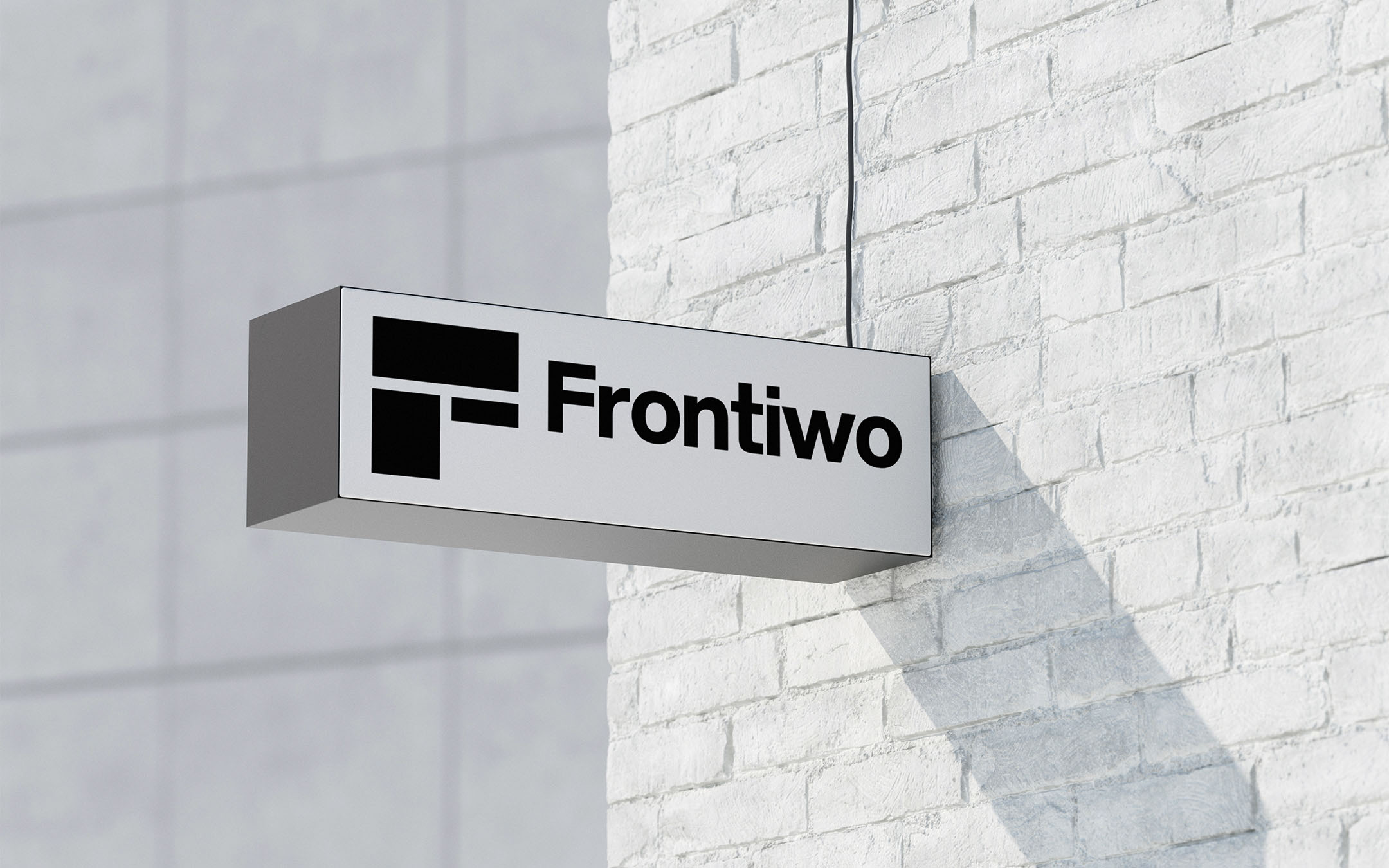 Logo Frontiwo - widok znaku na ścianie budynku