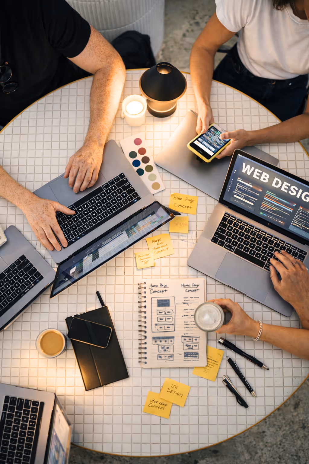 Team working together at a table depicting partnerships