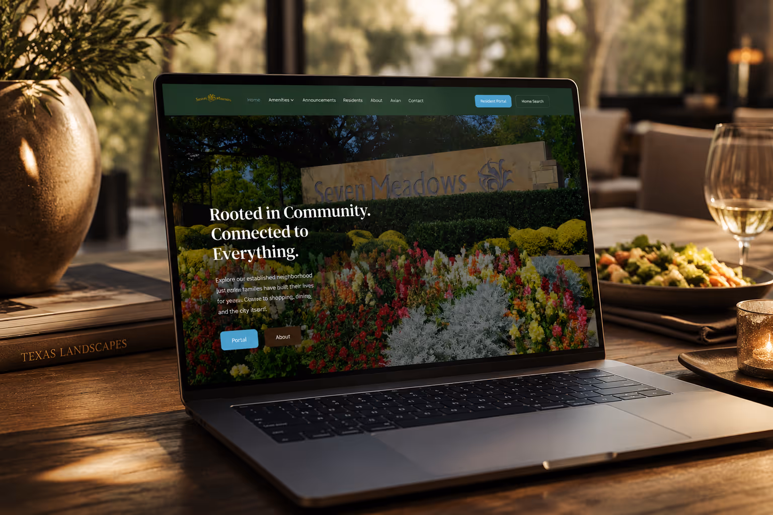 Laptop showing Seven Meadows HOA website