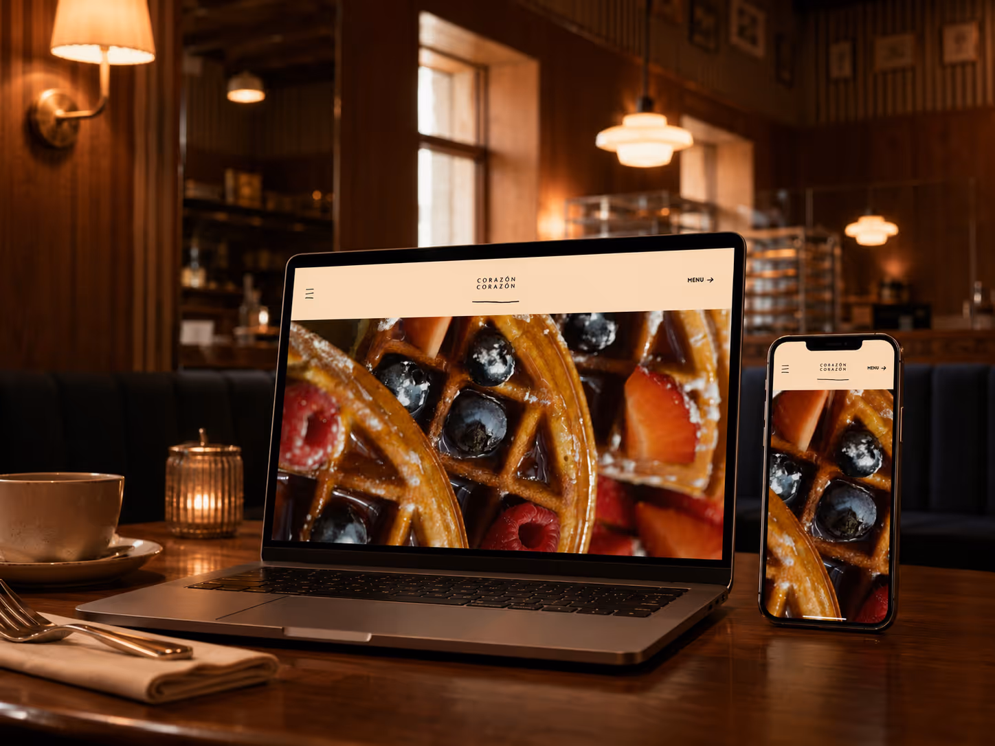 Laptop showing Corazon Corazon restaurant website