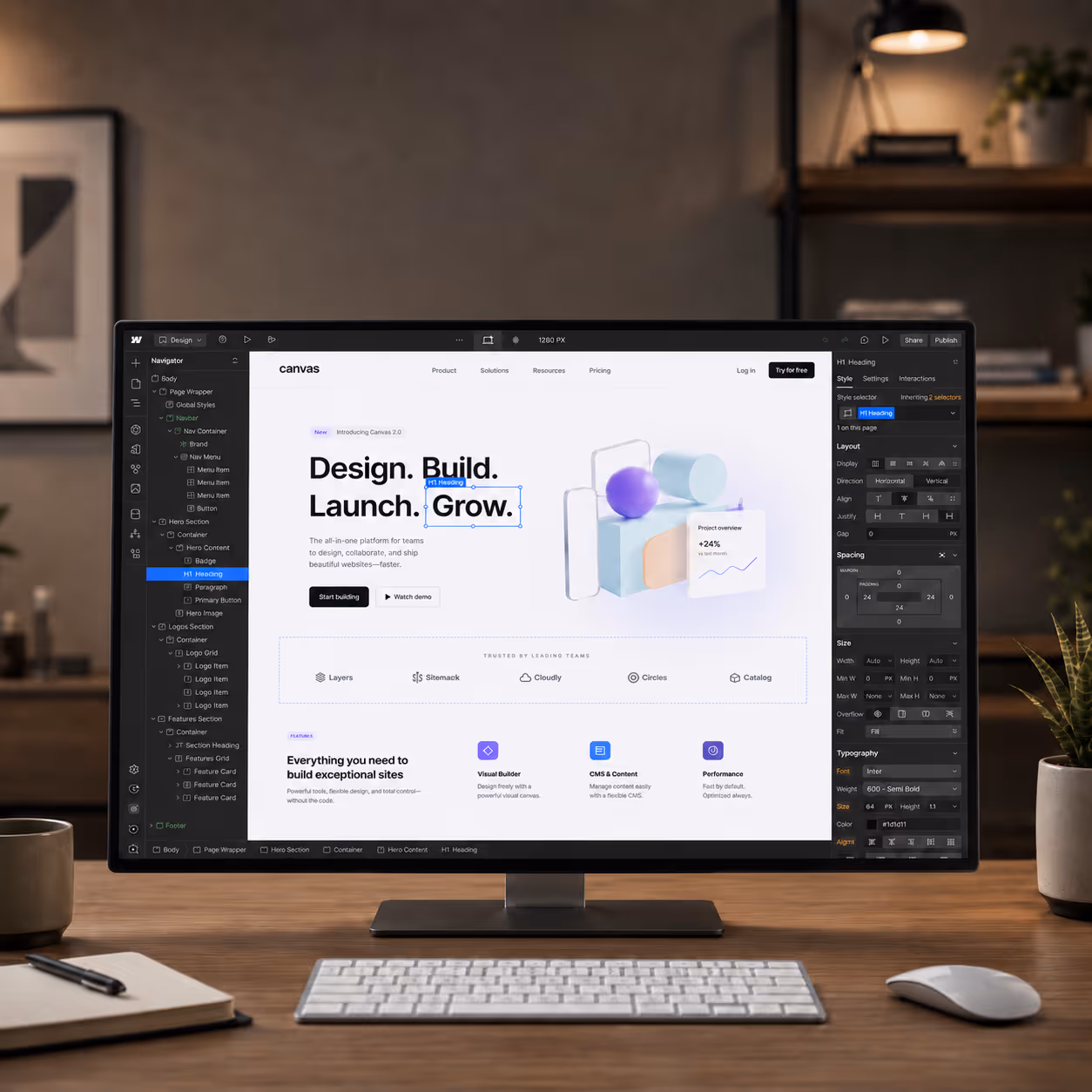 Computer in a modern office showing a website being built on Webflow