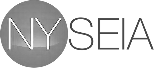 Logo with white letters 'NY' inside a grey circle followed by 'SEIA' in white letters on a dark background.