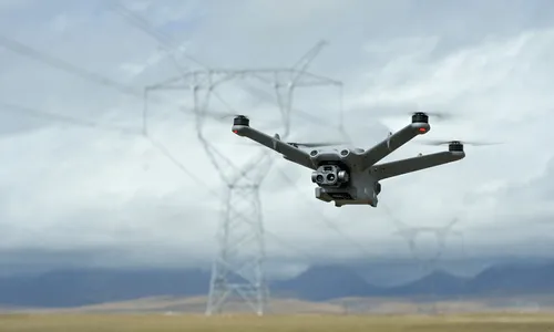 image of a dji dock drone in flight