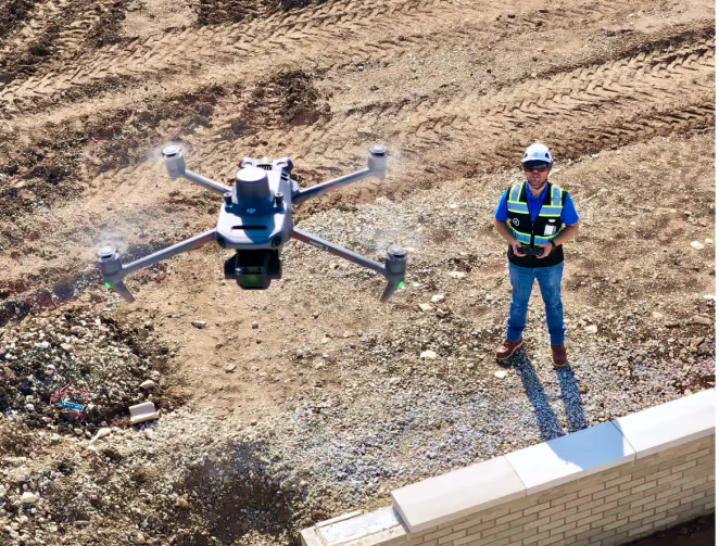 VDC manager taking a map of a construction site with a Mavic 3E