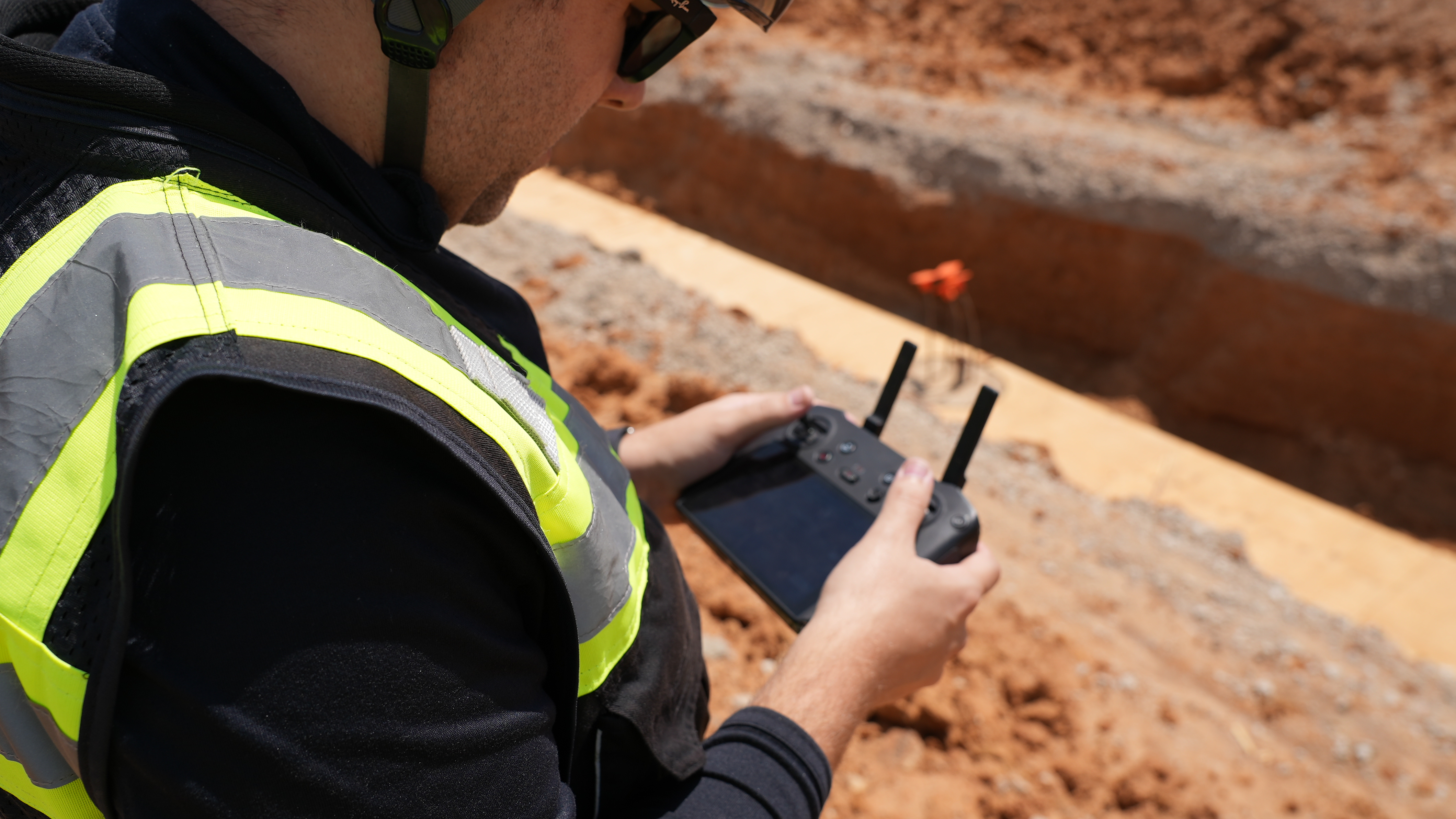 over the shoulder shot of drone operator
