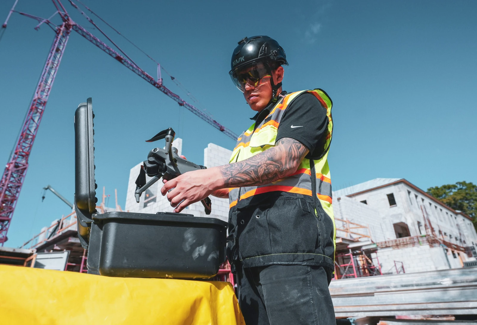 VDC manager setting up a drone on a jobsite